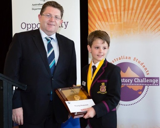 Young Historian of the Year, Angus Christie (Year 5) and Senator the Honourable Scott Ryan, Parliamentary Secretary to the Minister for Education. Photo: Steve Keough